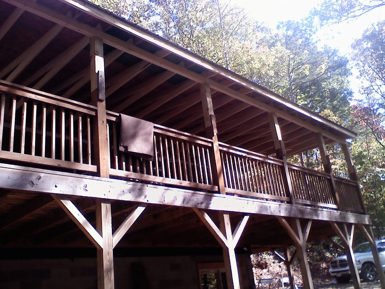 Timber framing under a new elevated porch and deck — Roof Leak Repair in Owensboro by Roofing Brothers